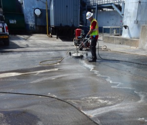 Cleaning Heavy Oil from Pavement with HC-2000 Atlanta GA